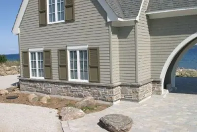 Coursed limestone cladding detail at Cobble Beach Golf Links