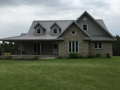 Limestone stonework beneath open sky at a Wiarton-area home