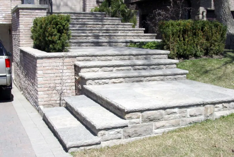 Limestone porch top landings and steps at a residential entrance